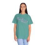 Person wearing a teal t-shirt with text on a white background