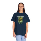 Person wearing a navy blue t-shirt with a graphic design and text on a white background