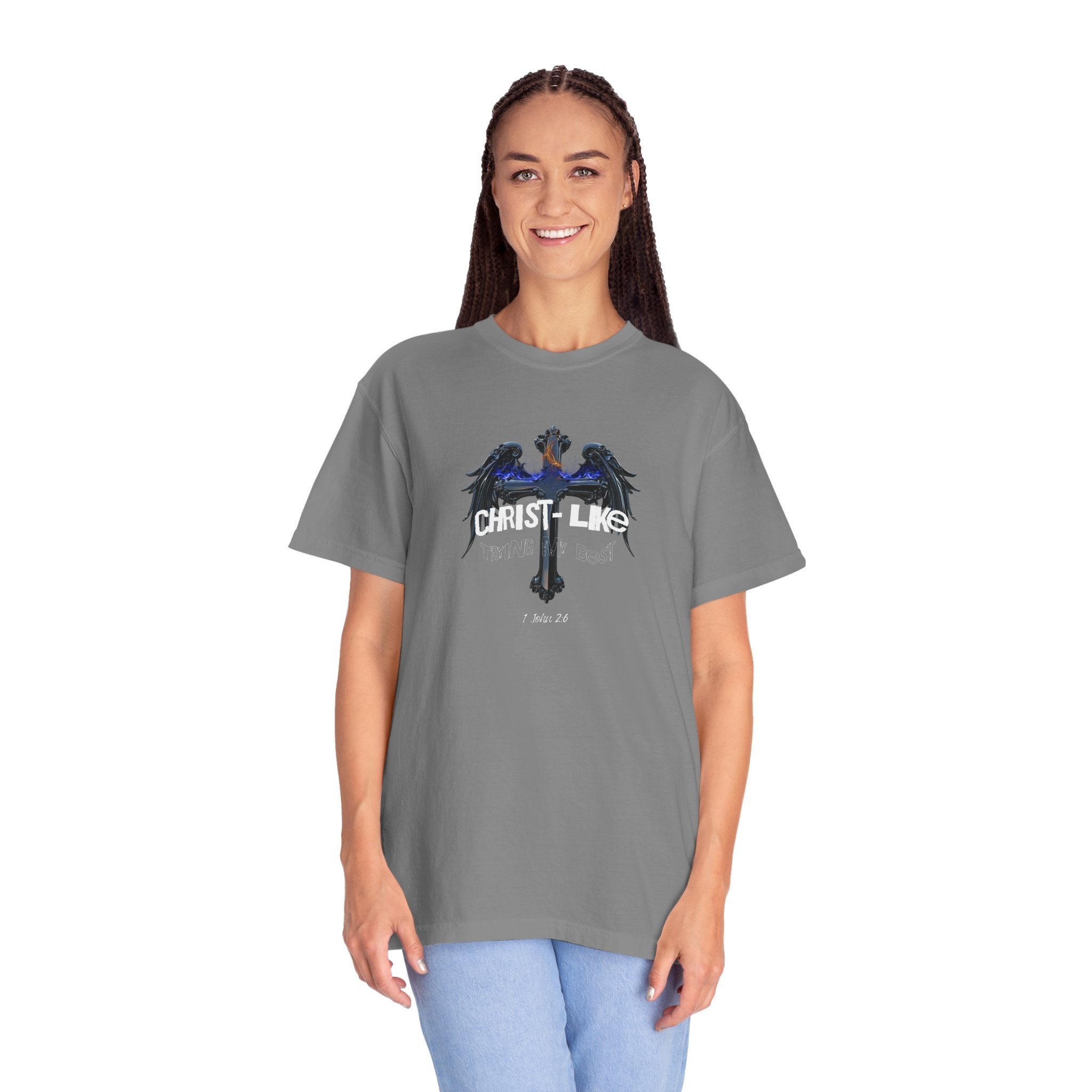 Person wearing a gray t-shirt with a graphic design on a white background