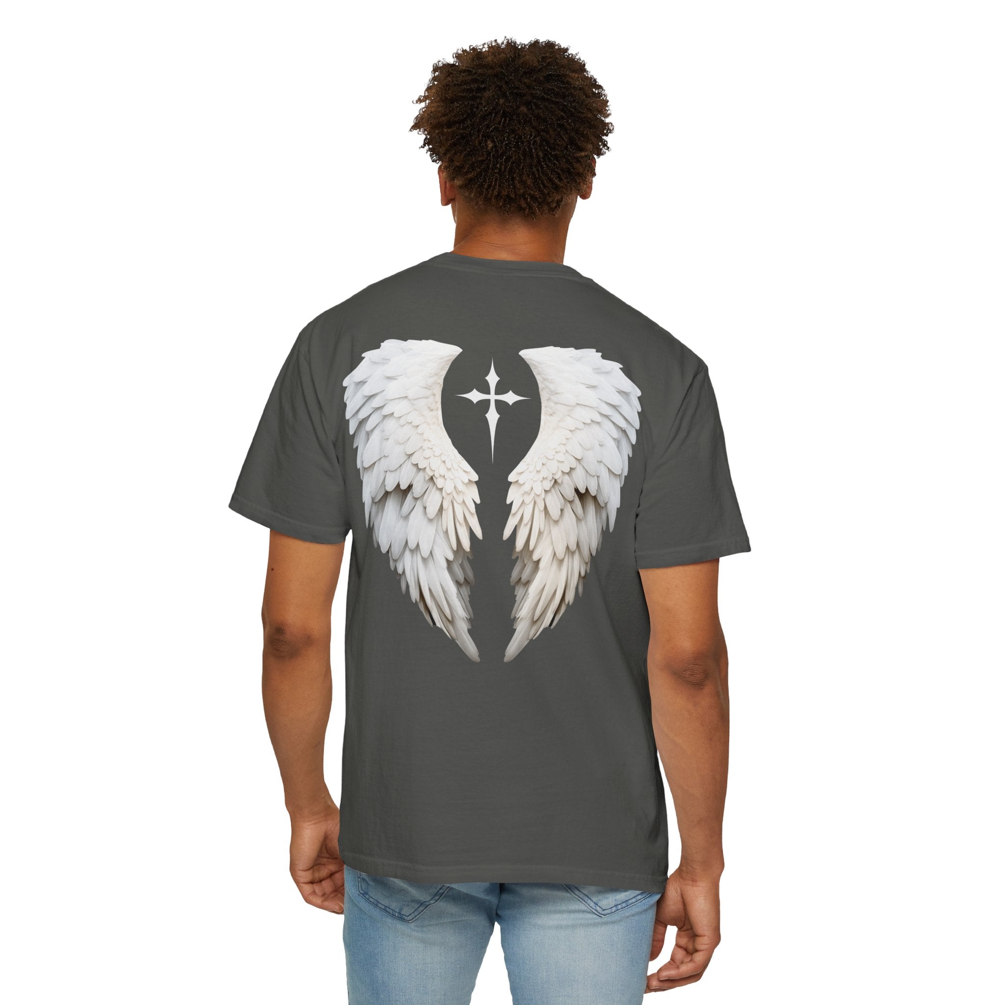 Person wearing a gray t-shirt with white angel wings design on the back