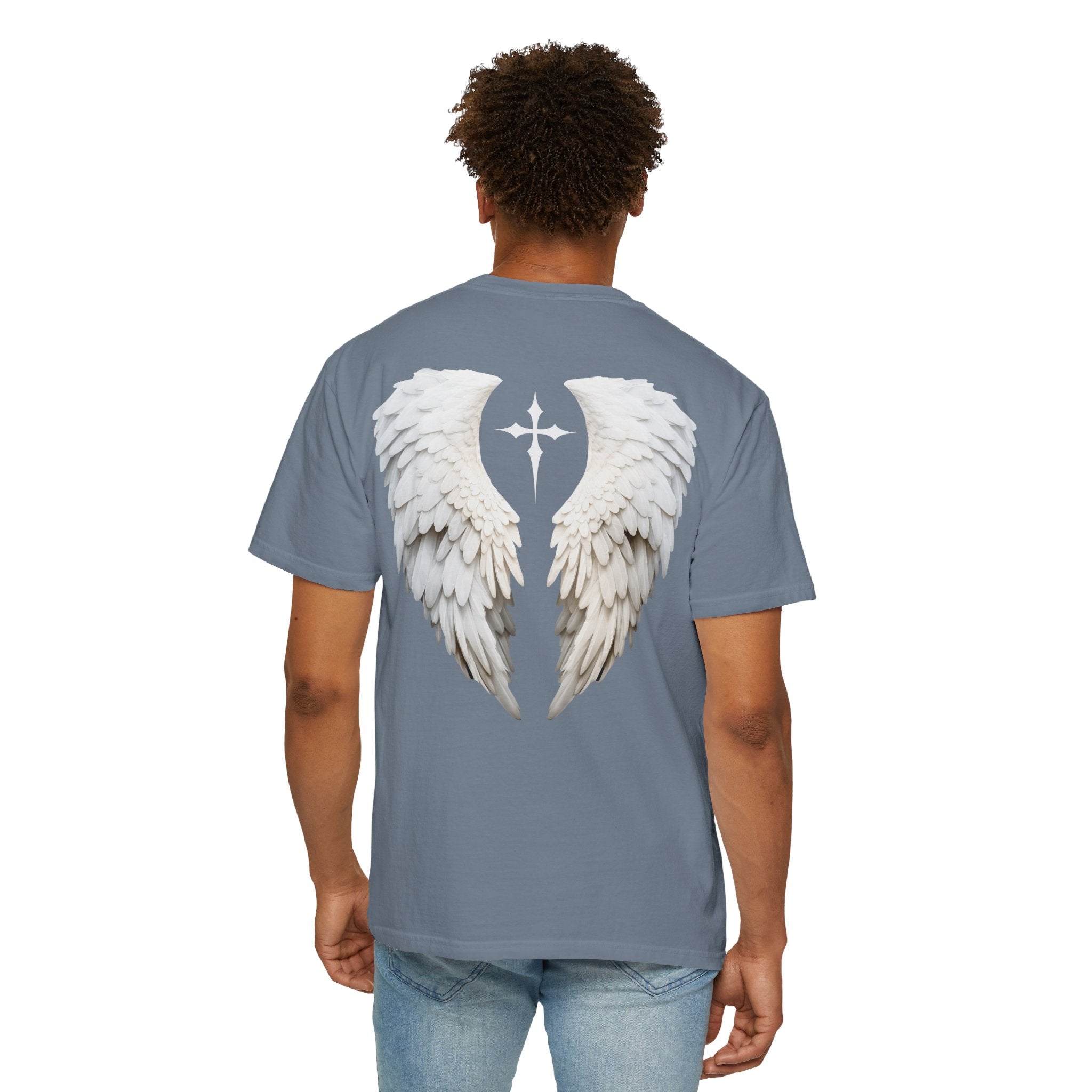 Person wearing a gray t-shirt with angel wings design on the back