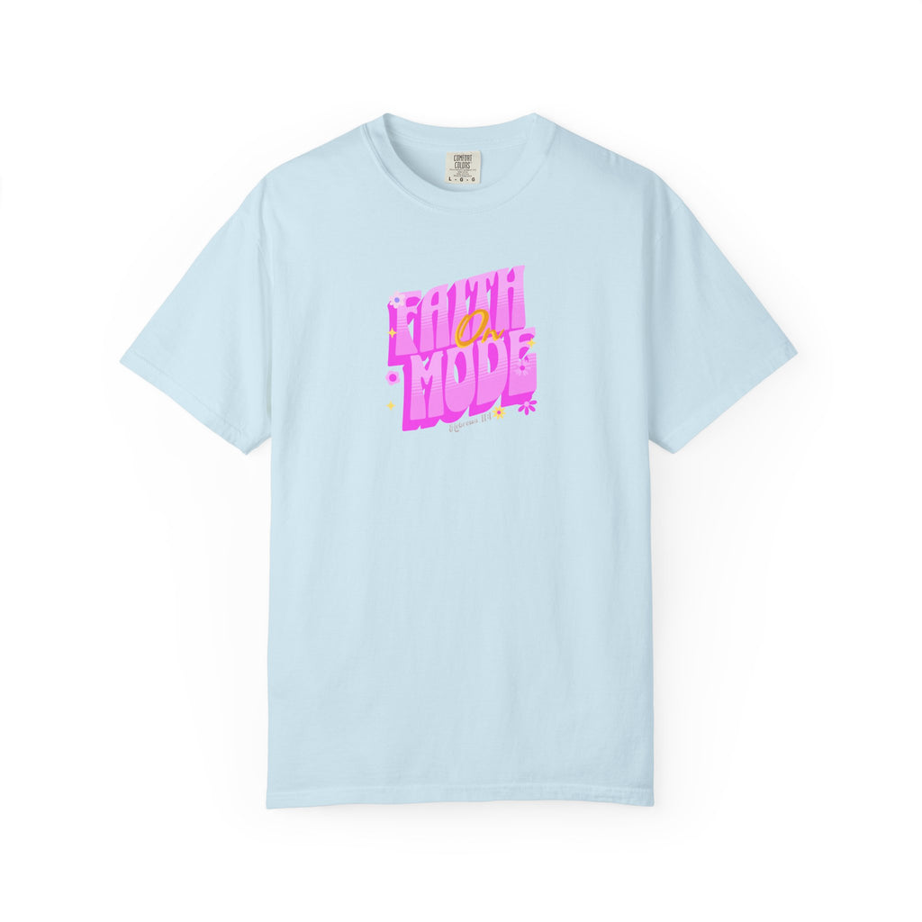 Light blue t-shirt with colorful text on a white background
