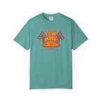 Teal t-shirt with red and yellow text design on a white background