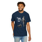 Man wearing a navy blue t-shirt with a graphic design and text on a white background