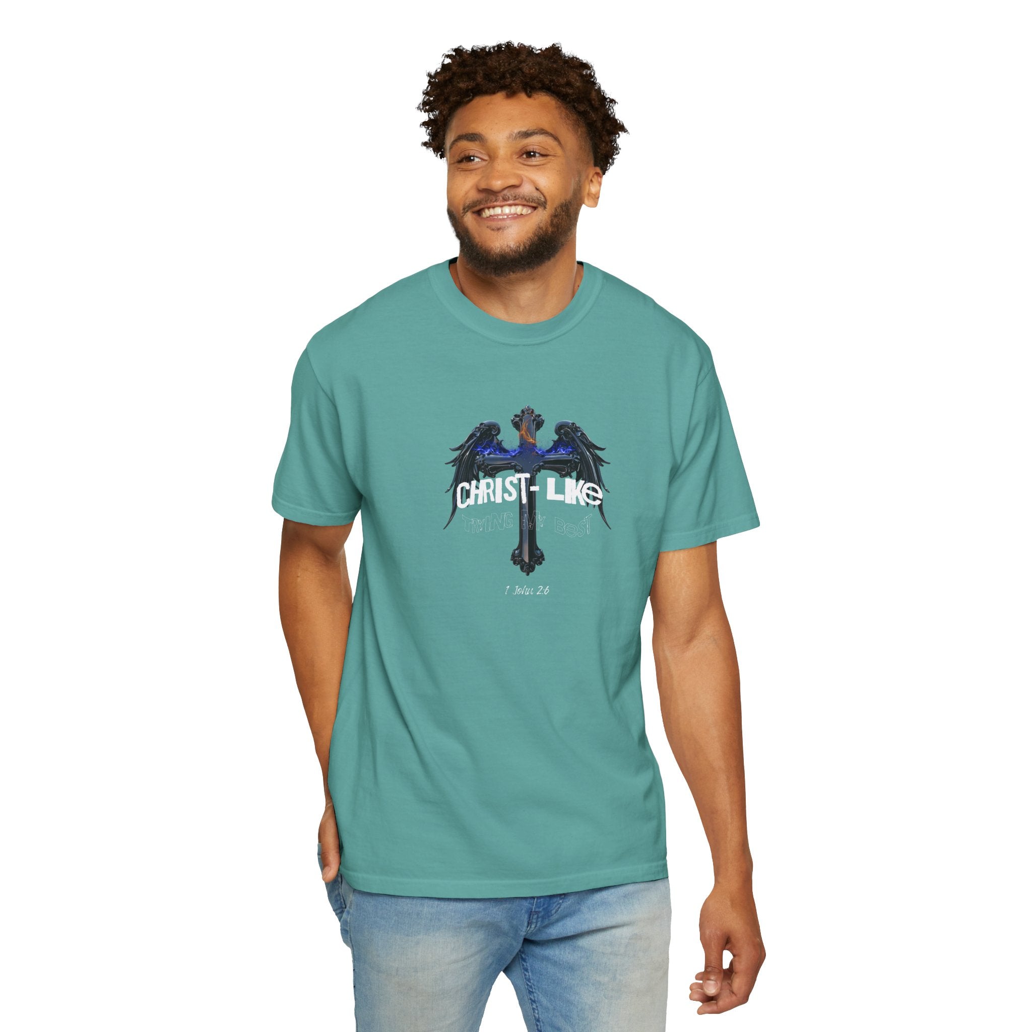 Man wearing a teal t-shirt with text on a white background