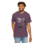 Man wearing a purple t-shirt with a graphic design and text on a white background