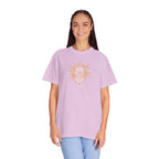 Person wearing a light purple t-shirt with a colorful design on a white background