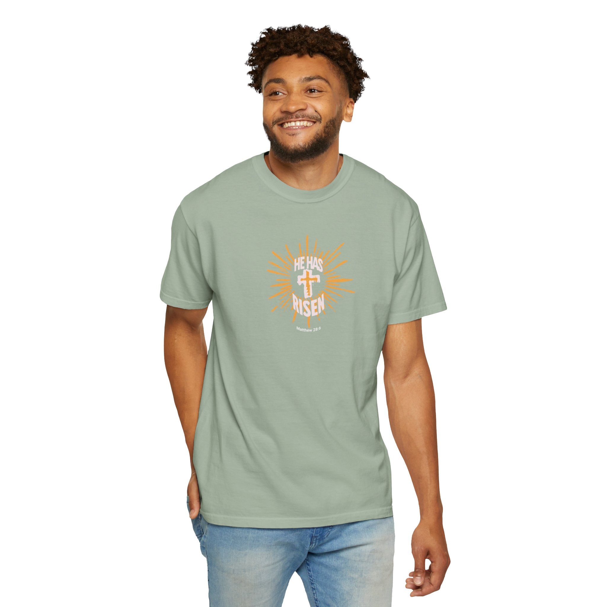Man wearing a light green t-shirt with 'stay humble' text on a white background