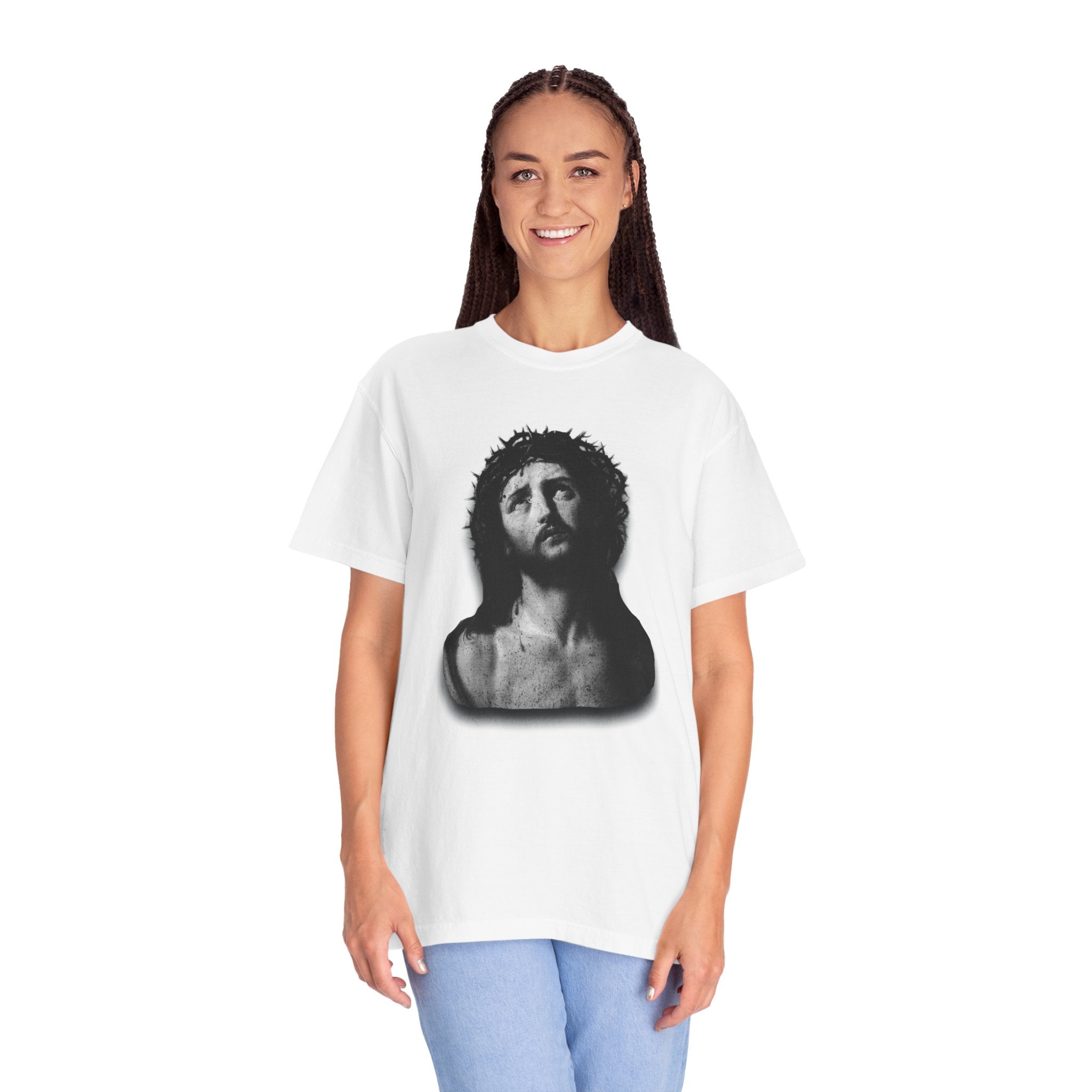 Person wearing a white t-shirt with a graphic design on a white background