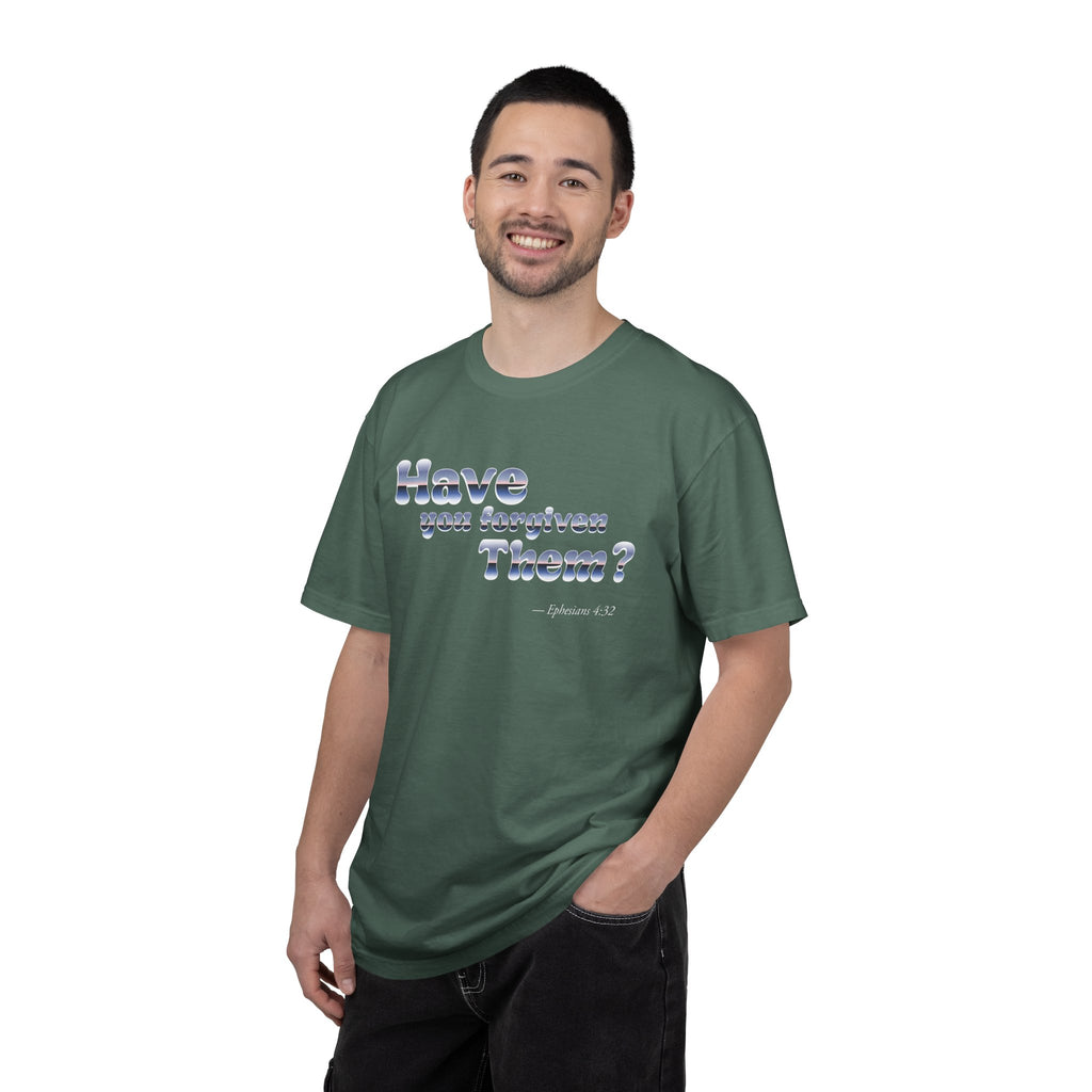 Man wearing a green t-shirt with text on a white background