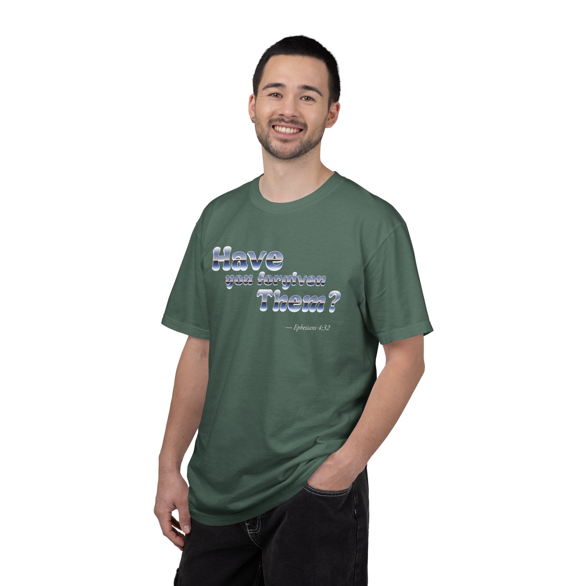 Man wearing a green t-shirt with text on a white background