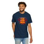Man wearing a navy blue t-shirt with red and yellow text on a white background