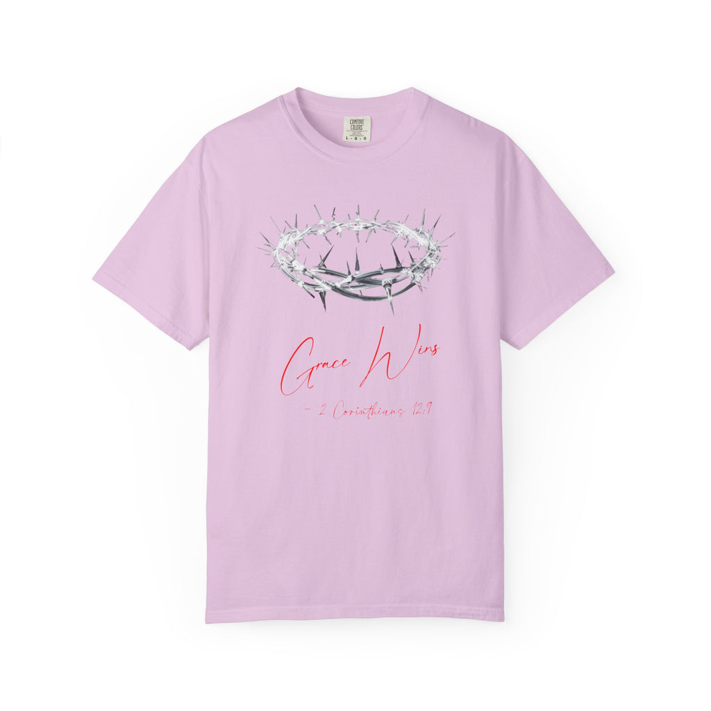 Pink t-shirt with a crown of thorns and 'Grace Wins' text on a white background