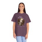 Woman wearing a purple t-shirt with a graphic design and text on a white background