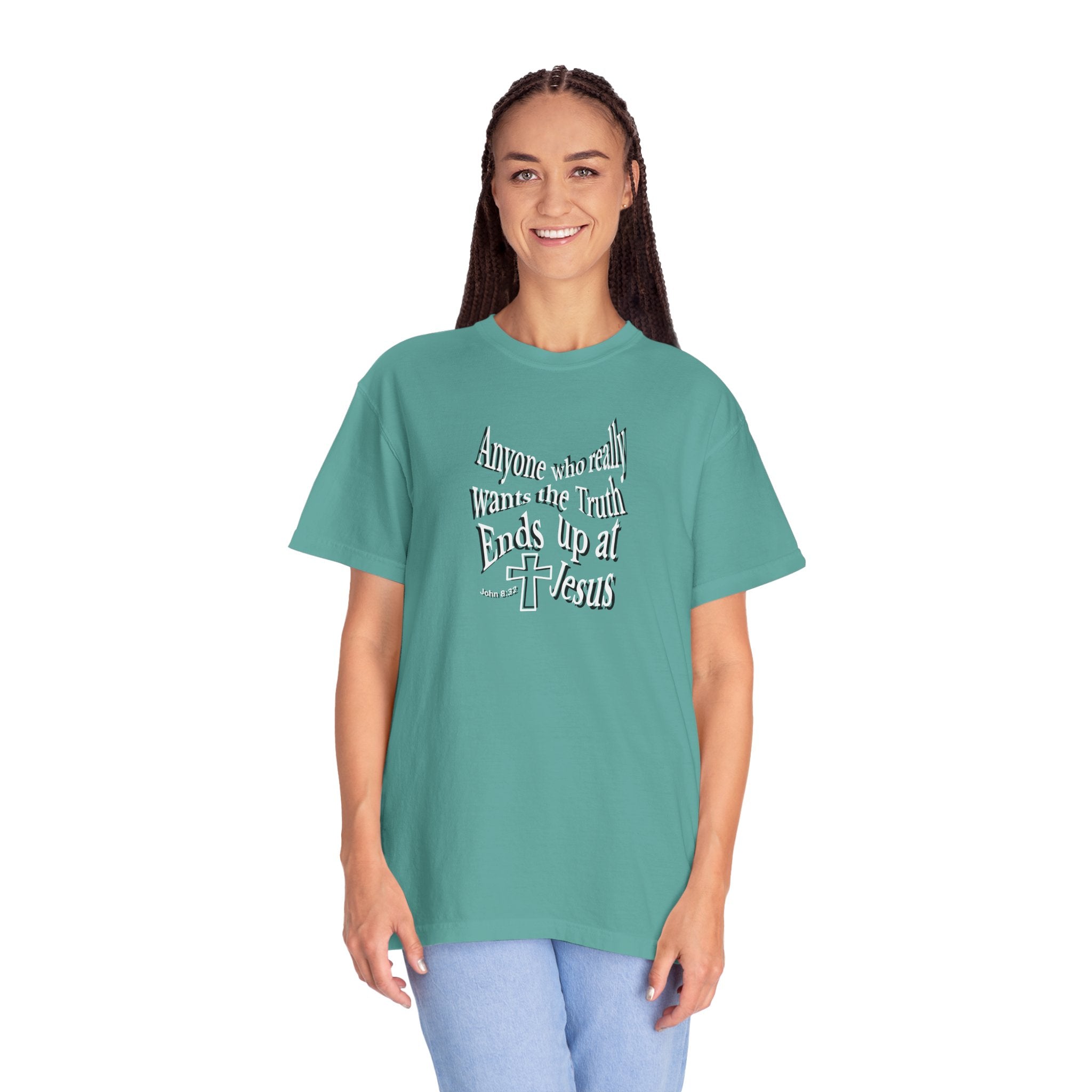 Person wearing a teal t-shirt with 'MARIJUANA' graphic design on a white background