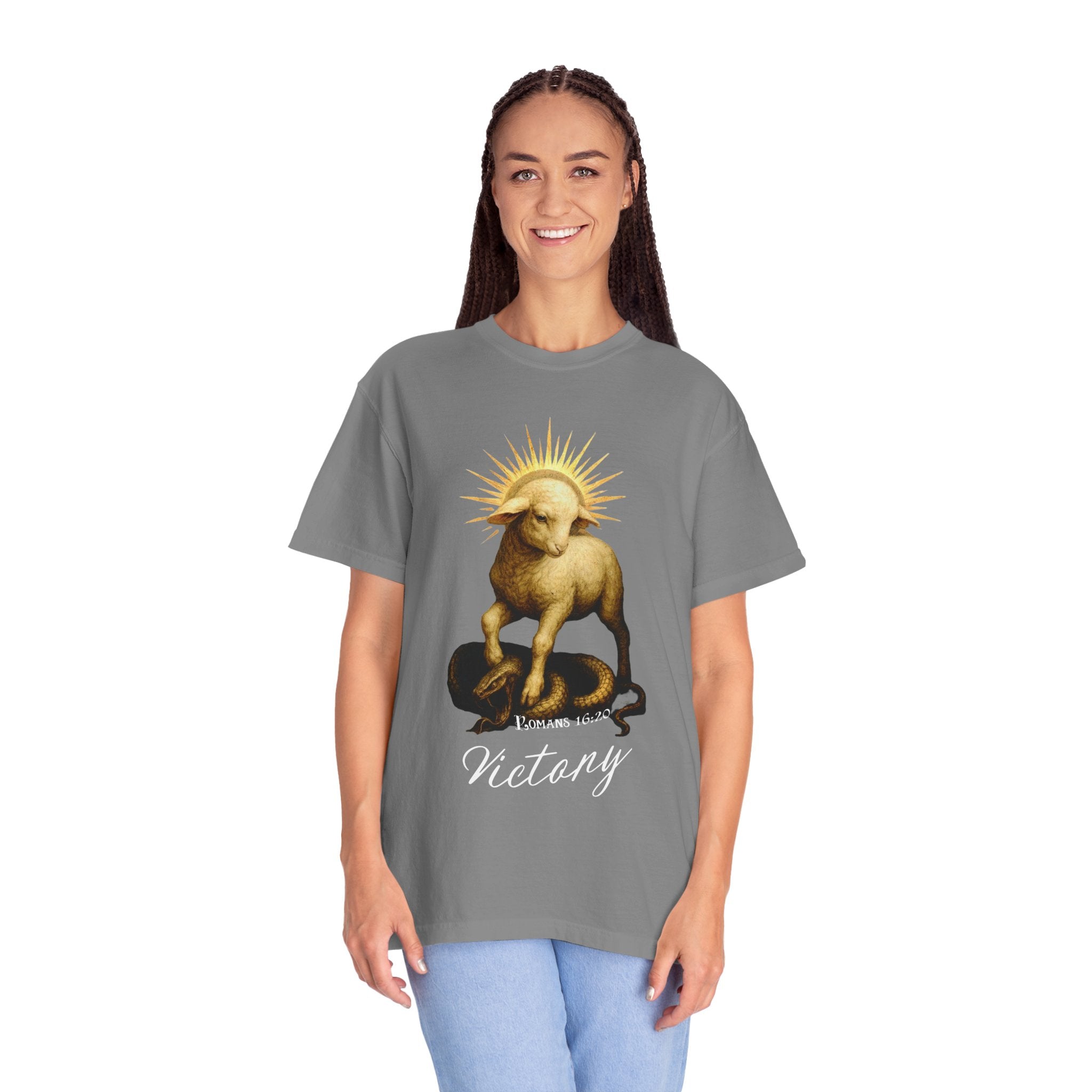 Person wearing a gray t-shirt with a graphic design on a white background