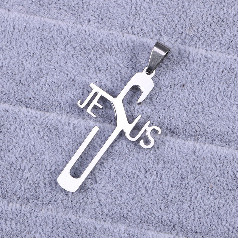 Silver cross-shaped pendant with 'Jesus' on a gray textured background