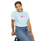 Person wearing a light blue t-shirt with a pink logo on a white background