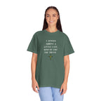Woman wearing a green t-shirt with text on a white background