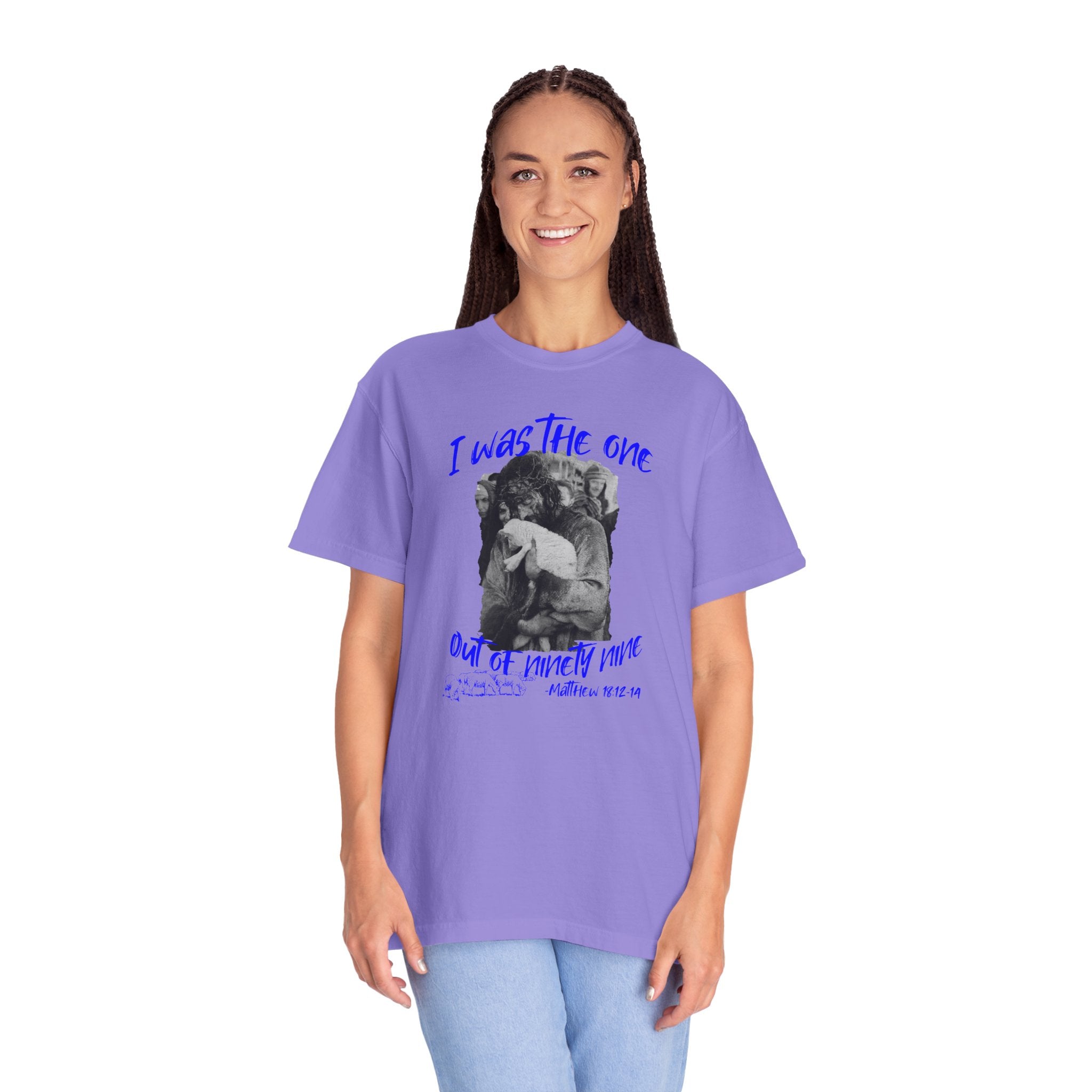 Person wearing a purple t-shirt with graphic design and text on a white background