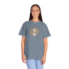 Woman wearing a blue t-shirt with a graphic design on a white background