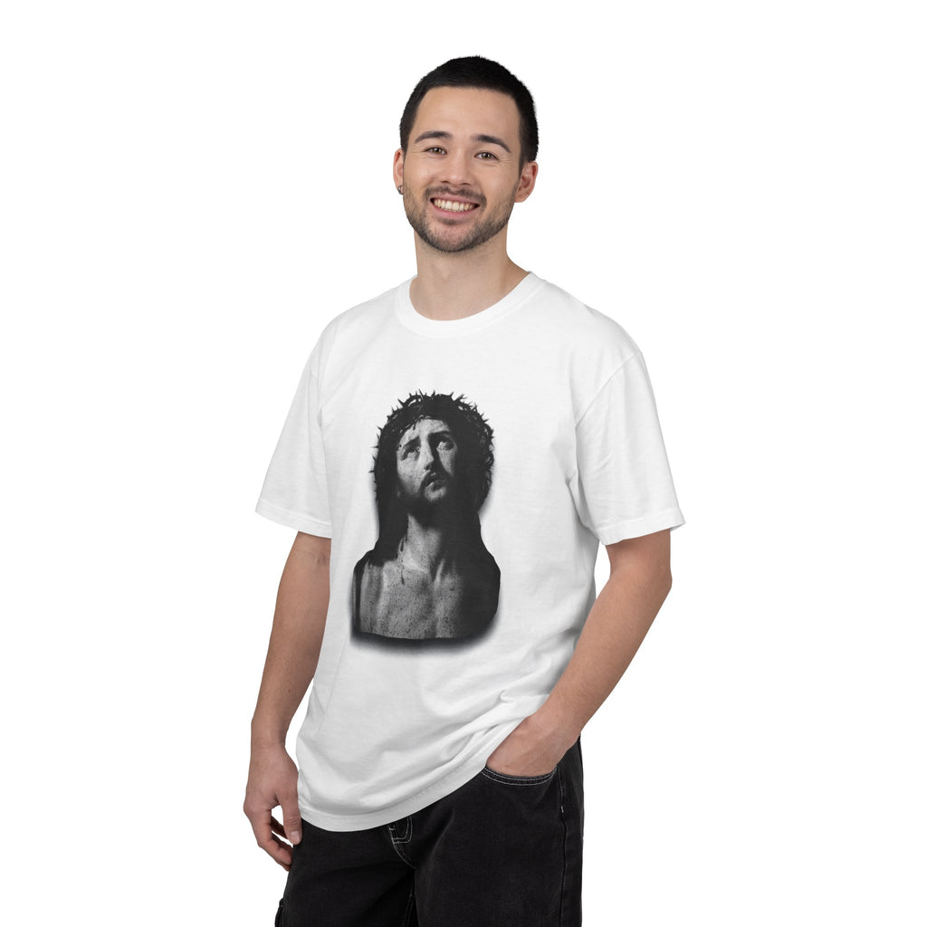 Man wearing a white t-shirt with a graphic design on a white background