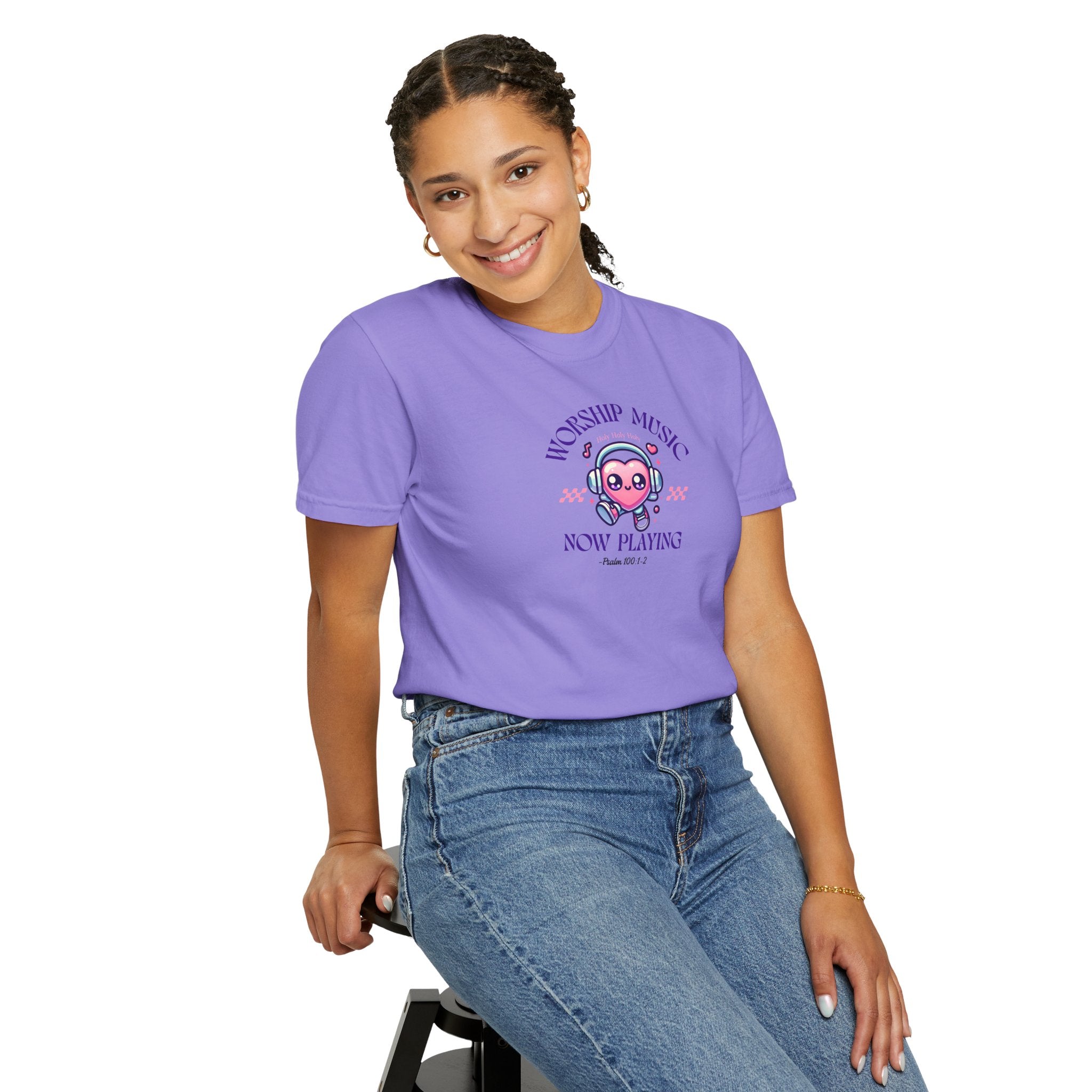 Person wearing a purple t-shirt with a graphic design on a white background
