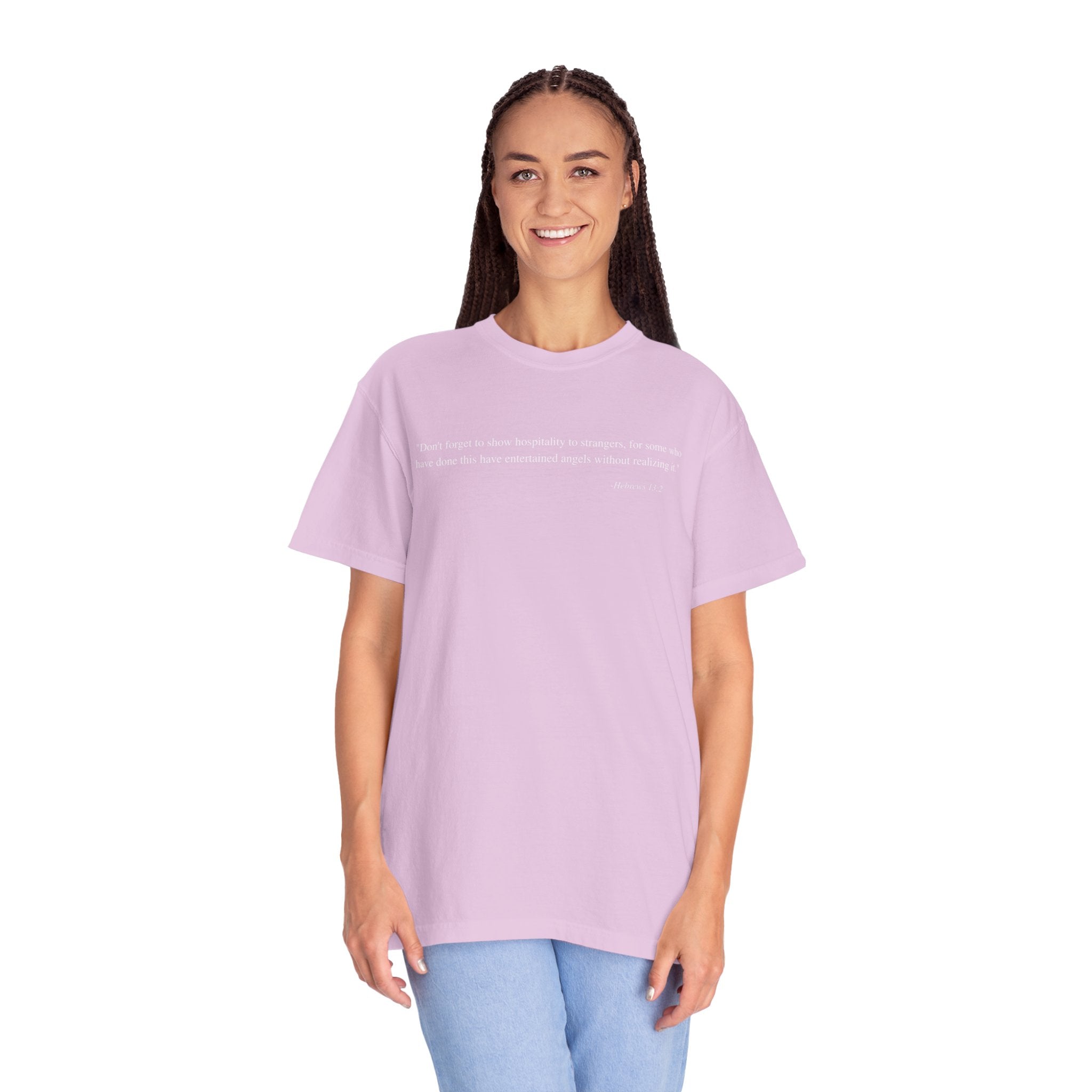 Woman wearing a light purple t-shirt with a logo on a white background