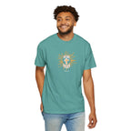 Man wearing a teal t-shirt with a graphic design on a white background