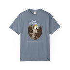 Blue t-shirt with a graphic of a dog and puppies and text 'Perfect Peace' on a white background