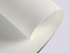 White fabric roll on a light gray background