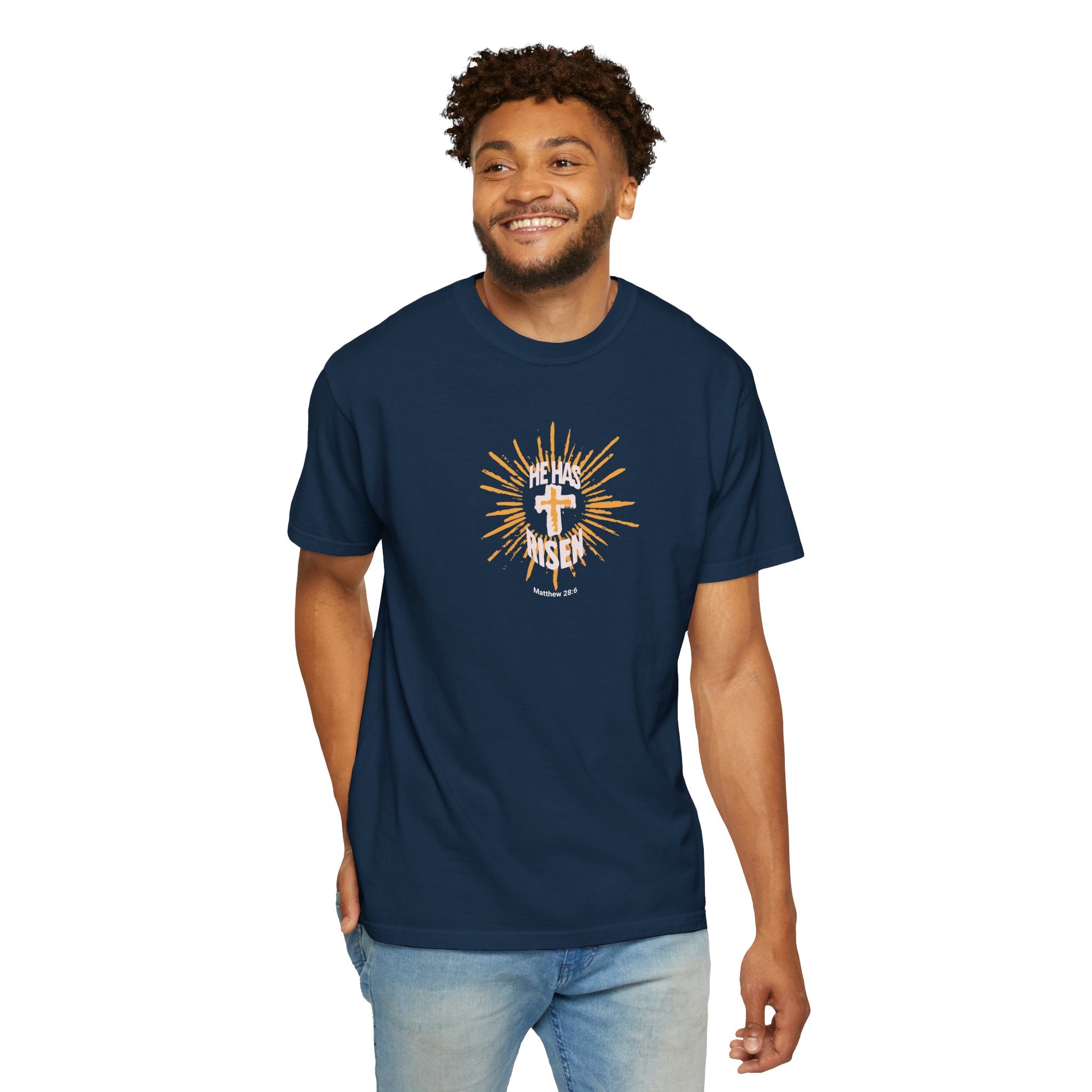 Man wearing a navy blue t-shirt with a graphic design on a white background