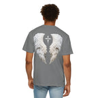 Person wearing a gray t-shirt with angel wings design on the back