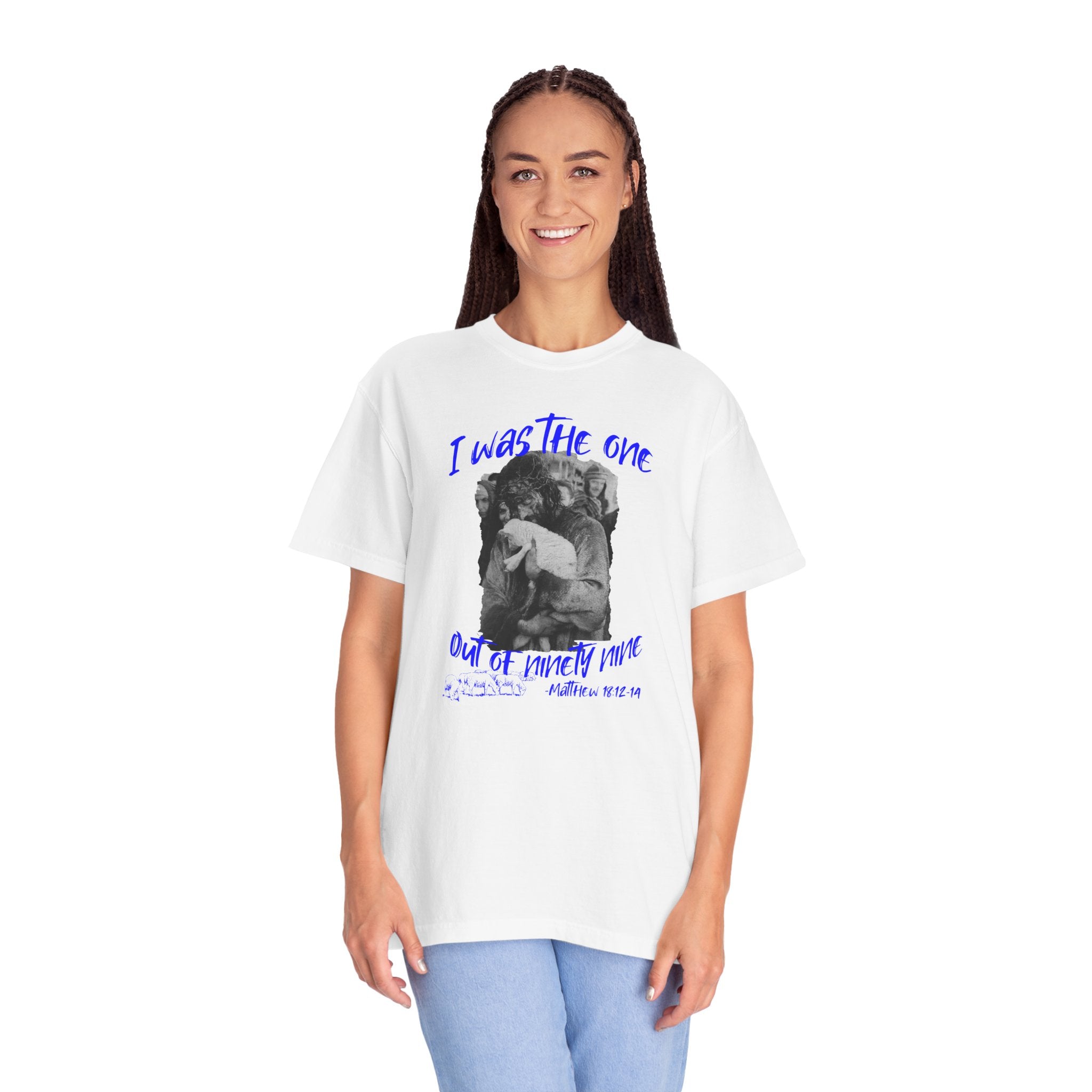 Person wearing a white t-shirt with text and graphic design on a white background