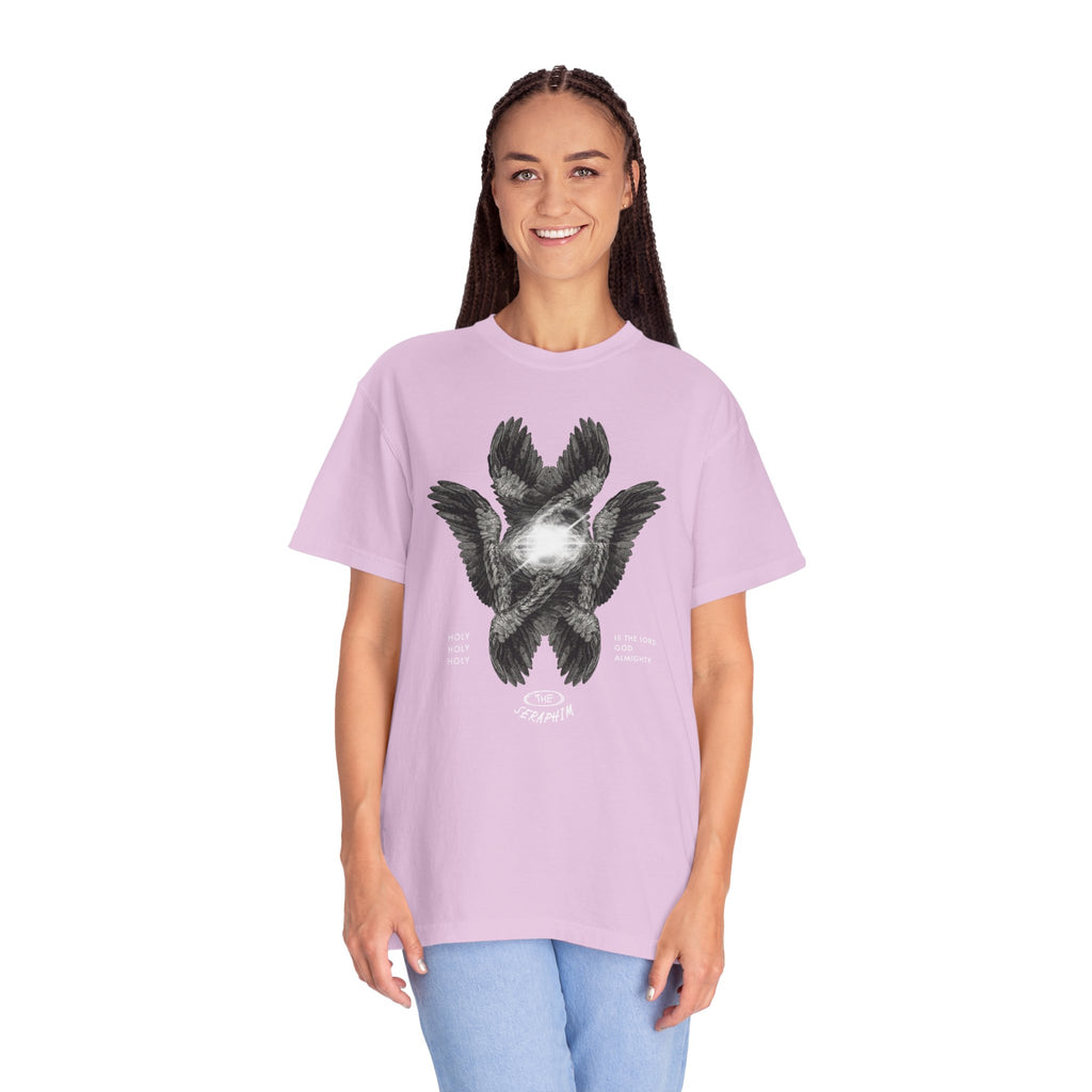 Person wearing a light purple t-shirt with a graphic design on a white background