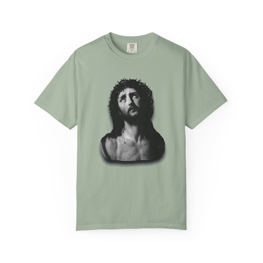 Light green t-shirt with a black and white graphic of a man's head on a white background