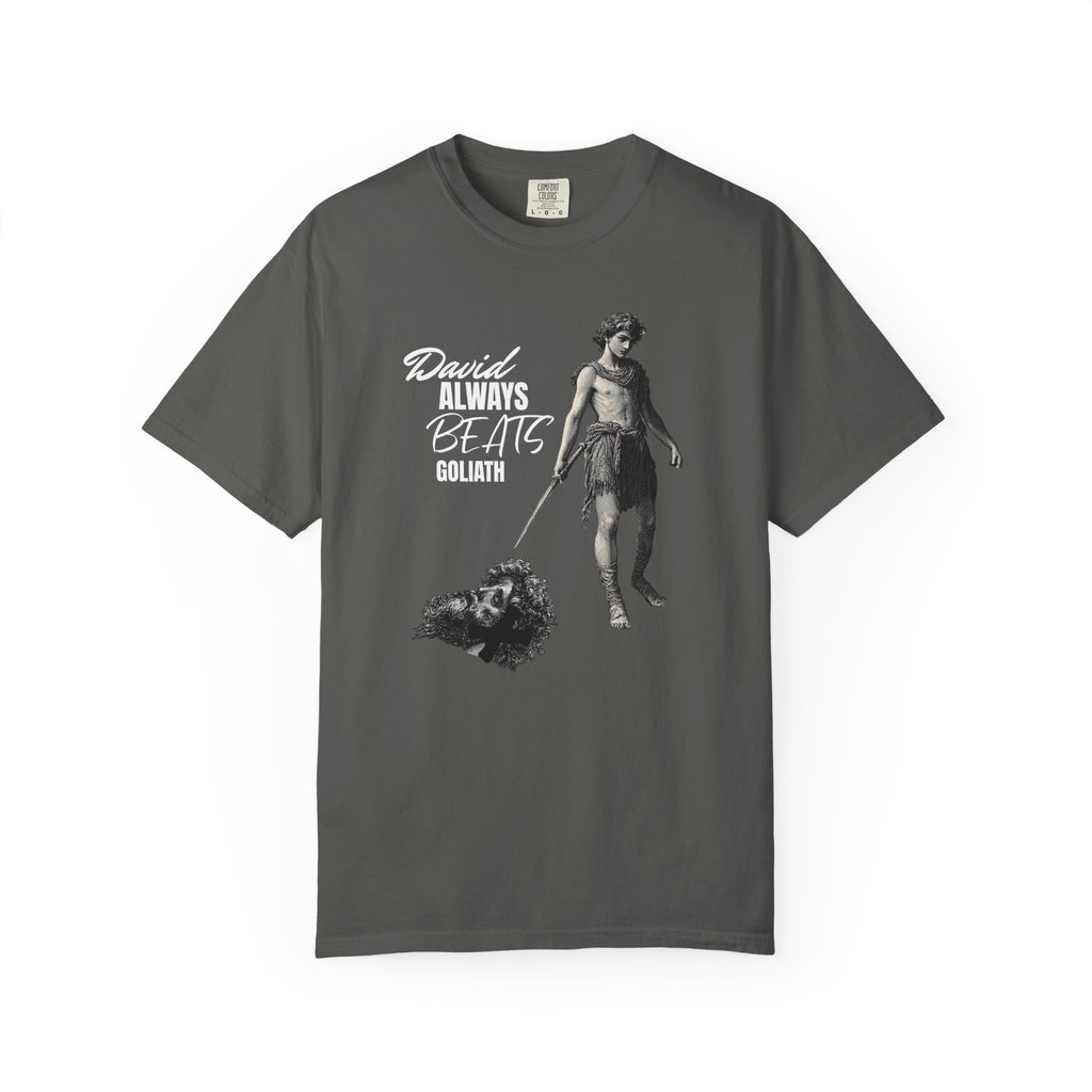 Gray t-shirt with graphic design and text 'David Always Beats Goliath' on a white background
