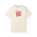 Beige t-shirt with pink heart and text design on a white background