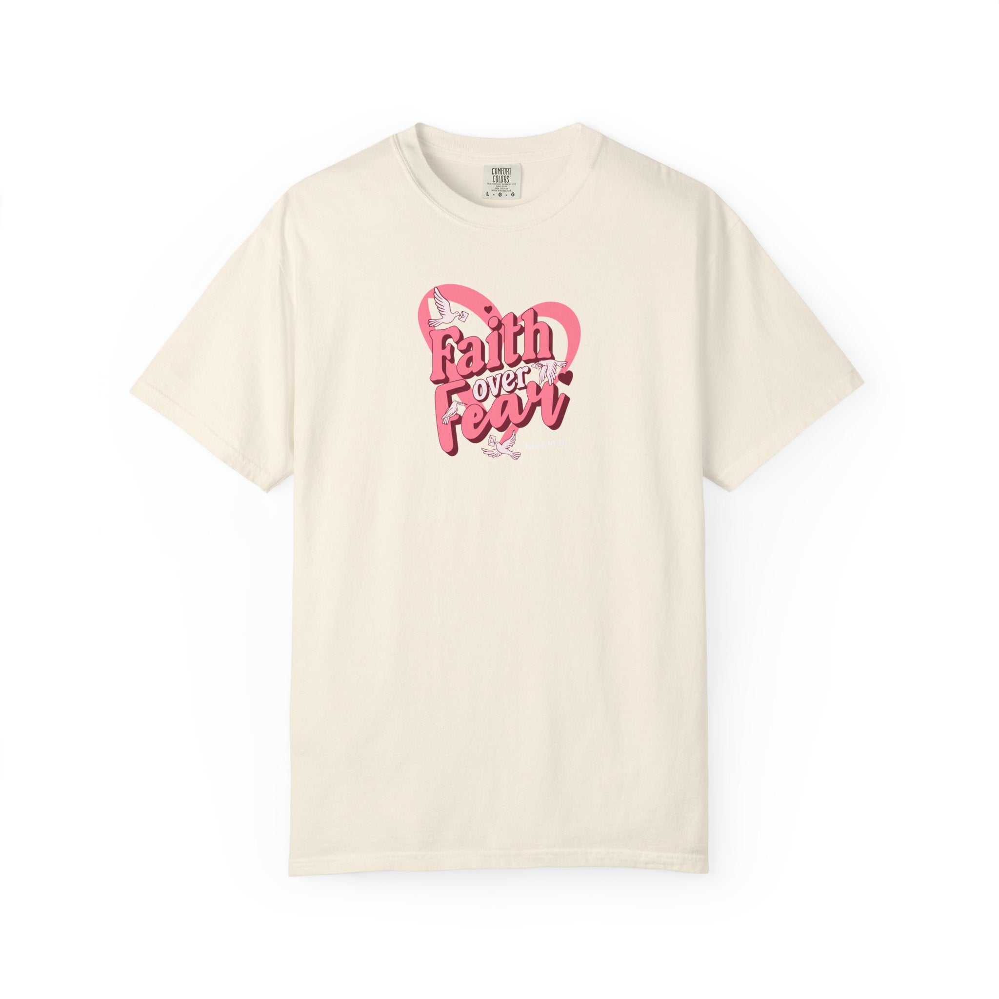 Beige t-shirt with pink heart and text design on a white background