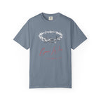 Gray t-shirt with a crown of thorns graphic and 'Grace Wins' text on a white background