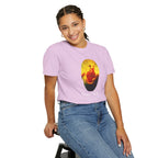 Person wearing a purple t-shirt with a graphic design on a white background