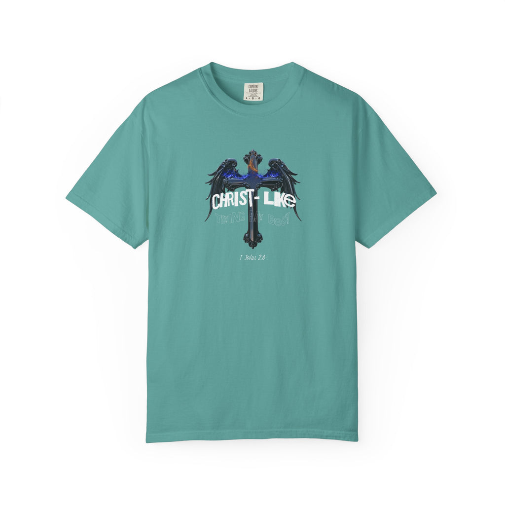 Teal t-shirt with motivational graphic and text on a white background