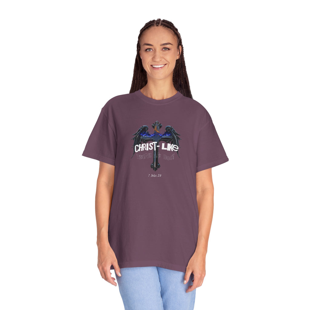 Person wearing a purple t-shirt with a graphic design on a white background