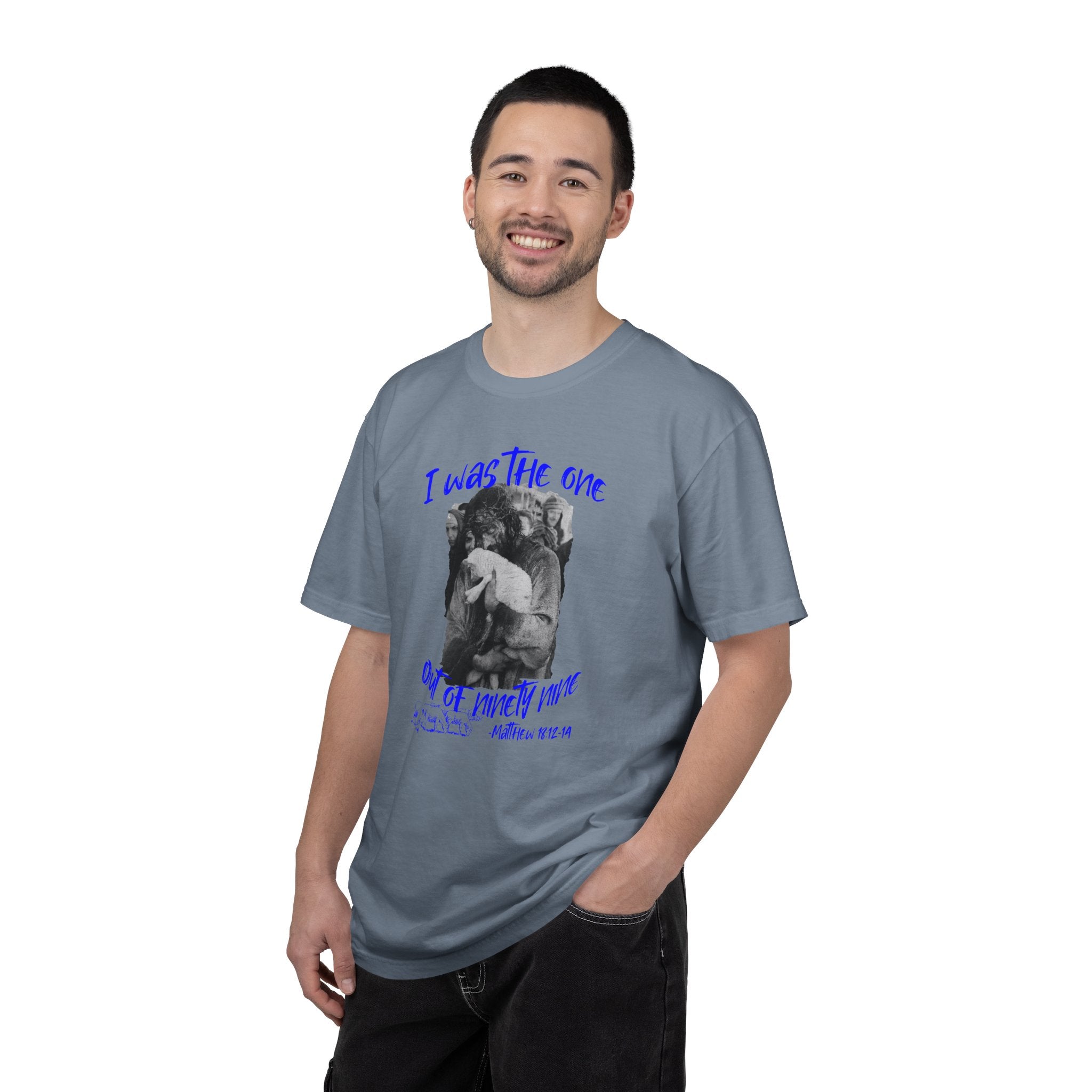 Man wearing a gray t-shirt with a graphic design and text on a white background