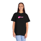 Person wearing a black t-shirt with 'God is Good' text and heart design on a white background