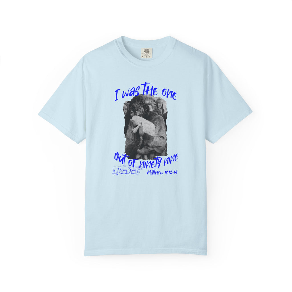 Light blue t-shirt with graphic design and text on a white background