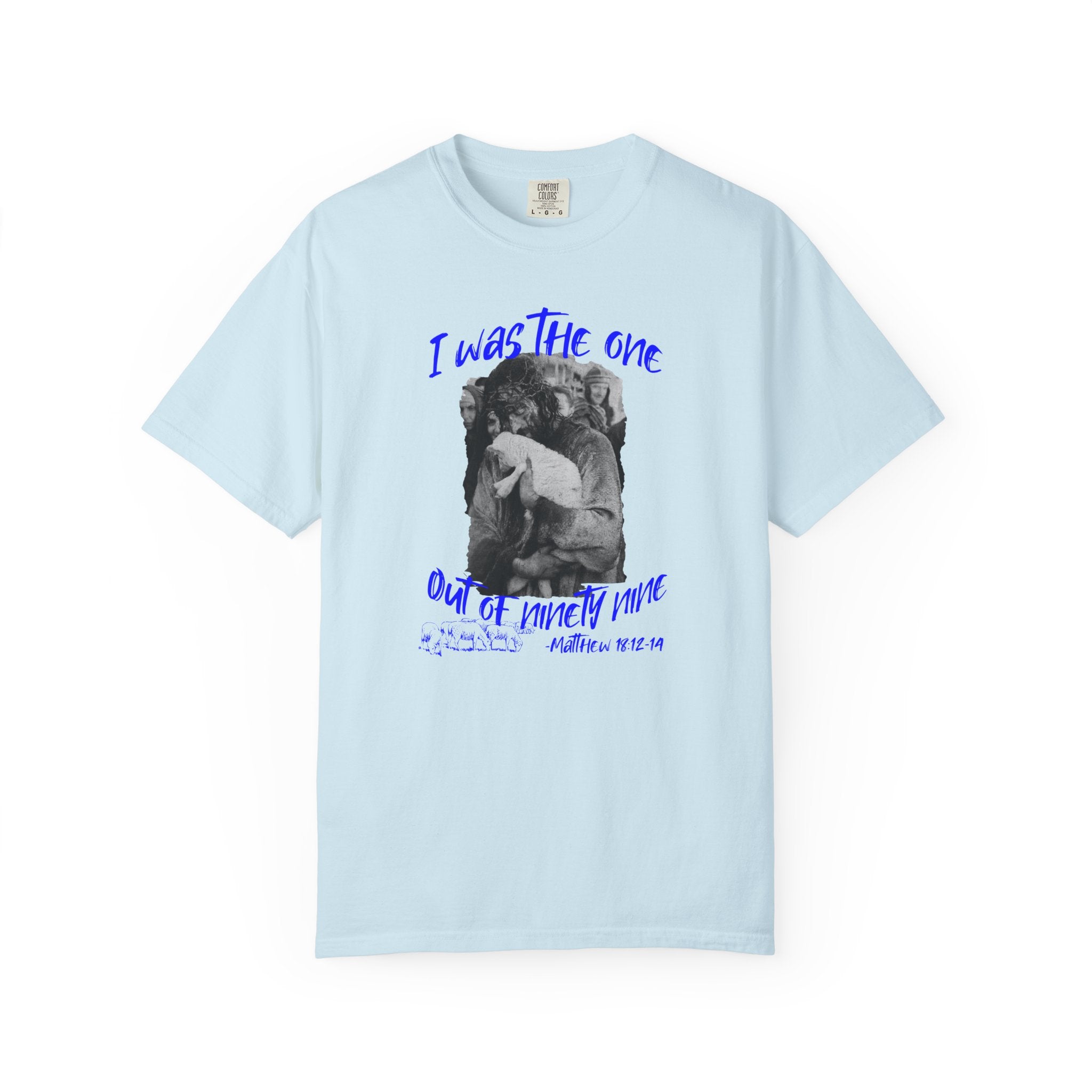 Light blue t-shirt with graphic design and text on a white background