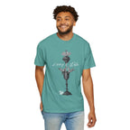 Man wearing a teal t-shirt with a graphic design on a white background