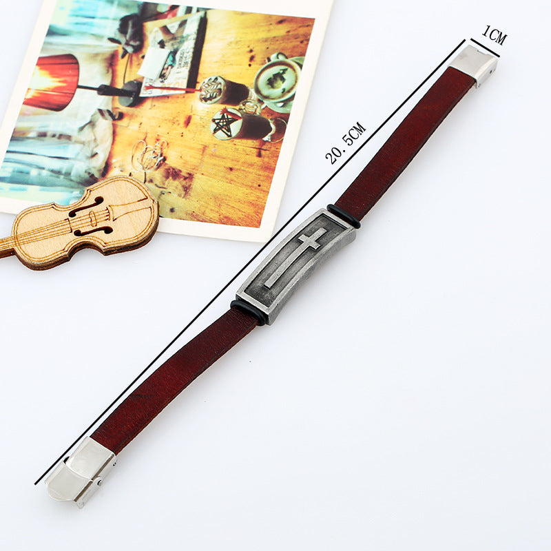 Brown leather bracelet with silver clasp on a white background