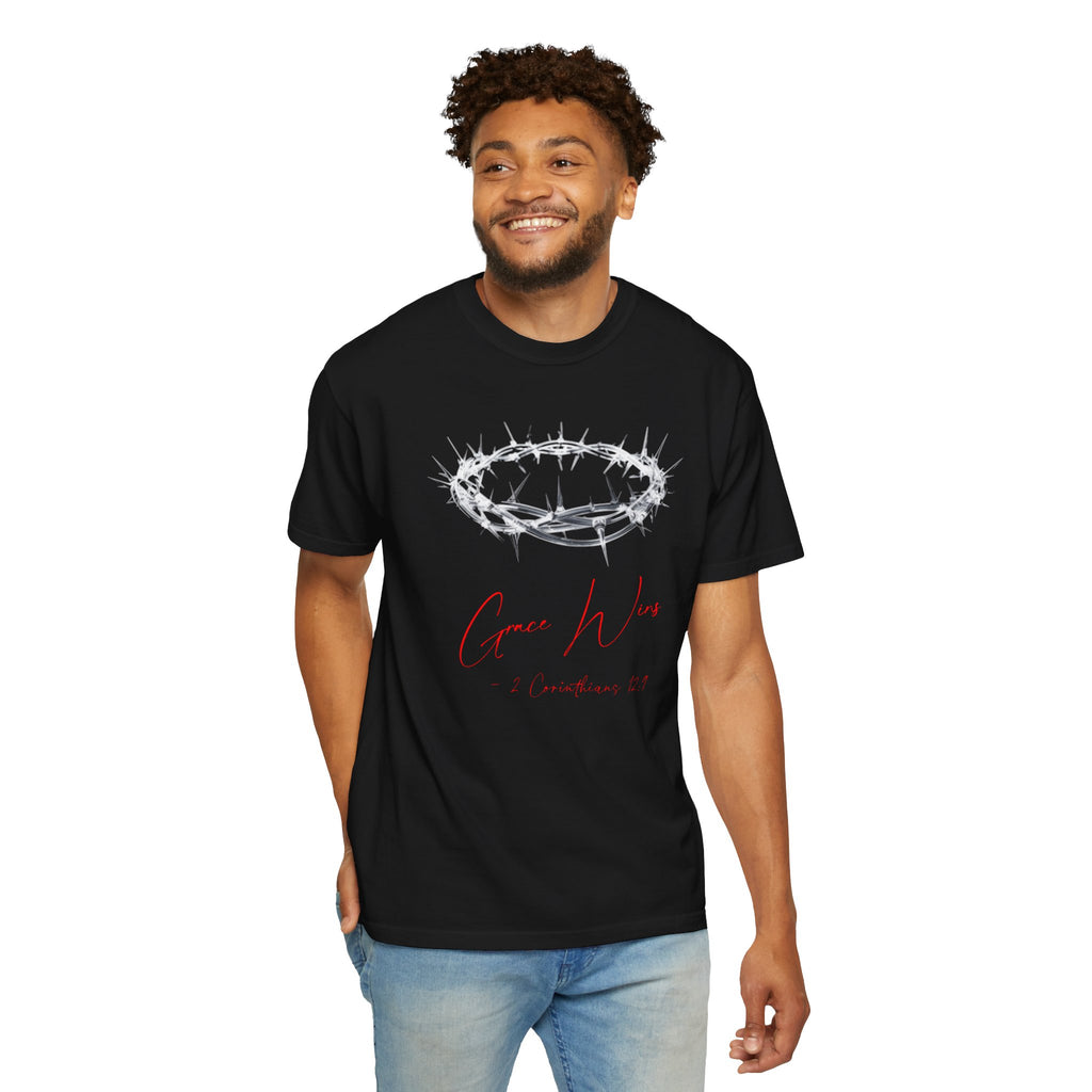 Man wearing a black t-shirt with a design and text on a white background